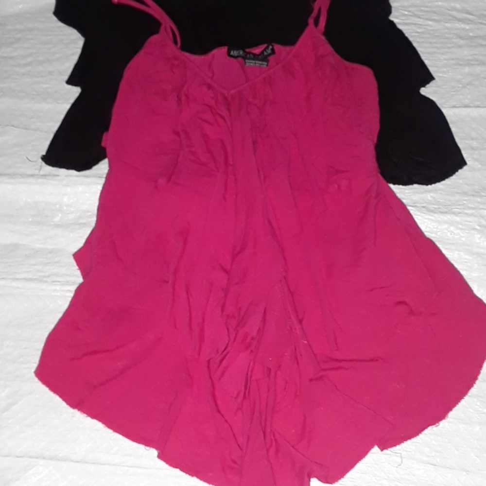 2, pink and black ruffled shirts